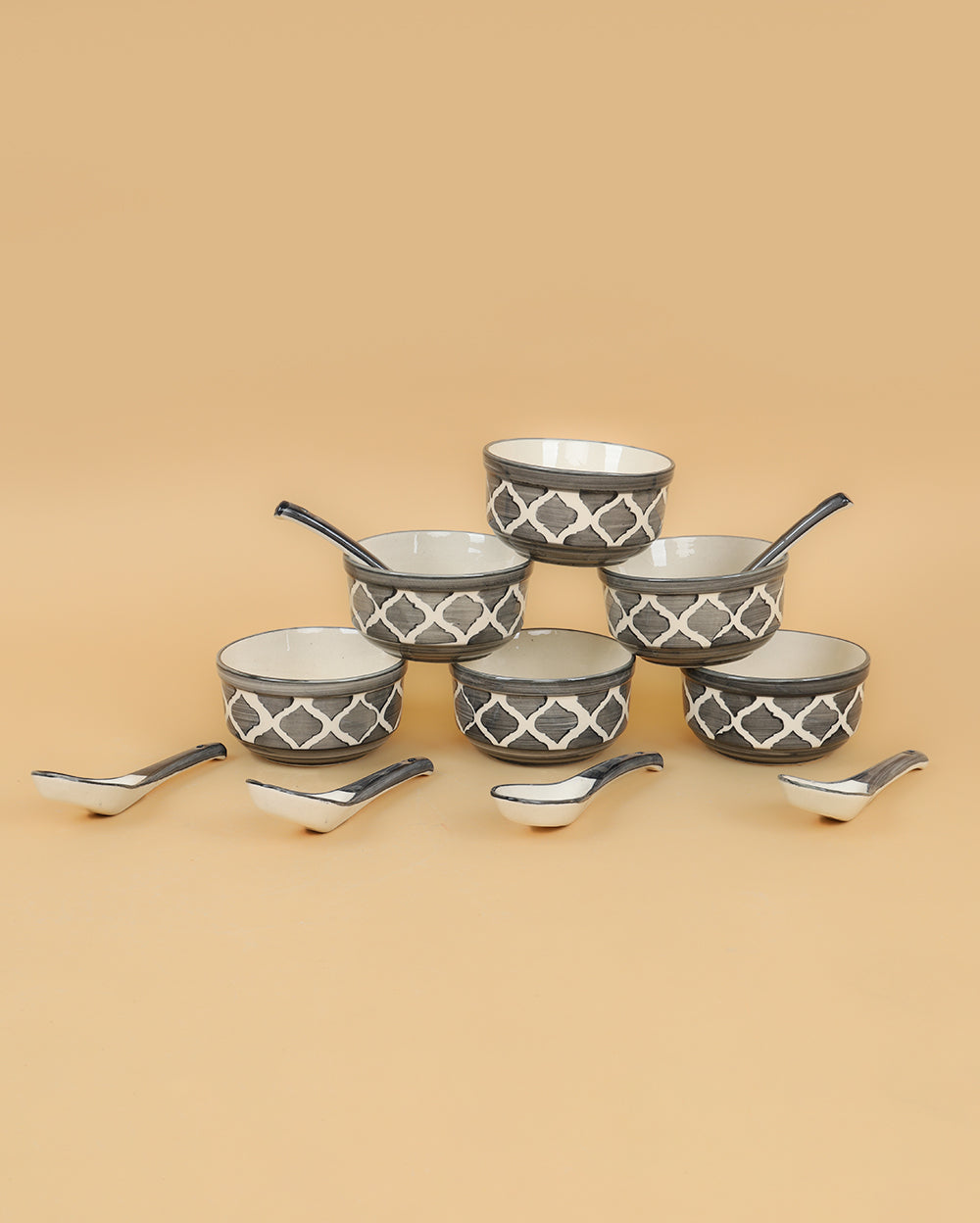 Ashy soup bowls with spoons